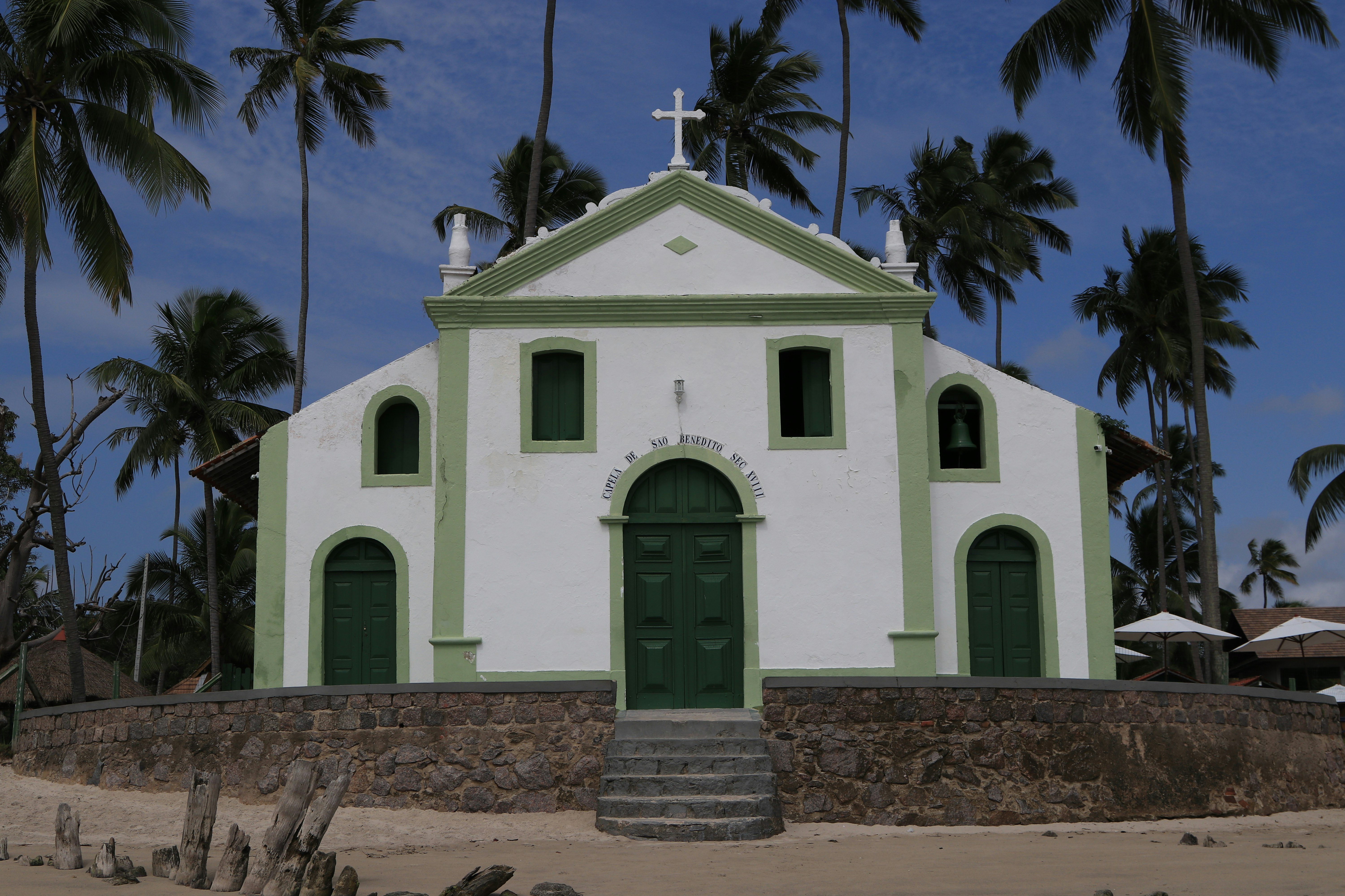 white and green concrete church